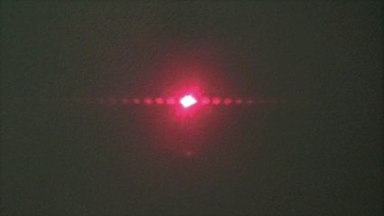 Diffraction pattern created by the laser and the hair