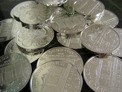 A pile of silver coins.