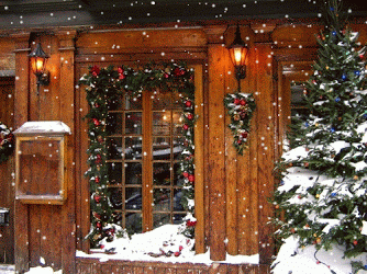 Cozy cottage in snow on a white Christmas.