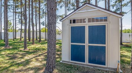 The image of a simple backyard shed.