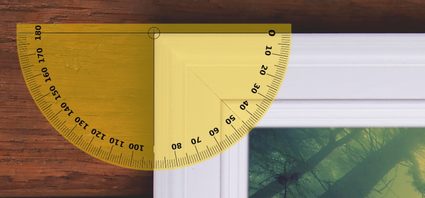 Image showing the 45° miter angles at the corners of a rectangular picture frame using a protractor.