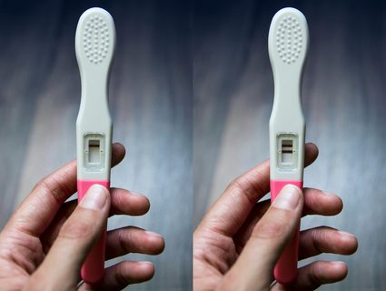 Pregnancy tests, positive and negative.