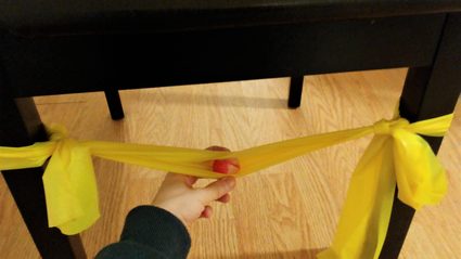 How to launch a bouncy ball using a resistance band and a chair