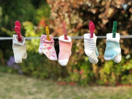 Baby socks on washing line