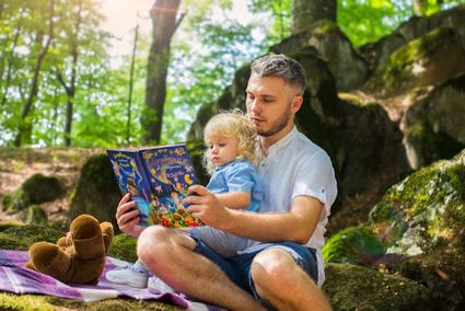 dad reading to his kid